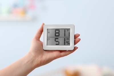 checking-thermometer Call Garner Heating & Air Conditioning today for professional AC unit installation.